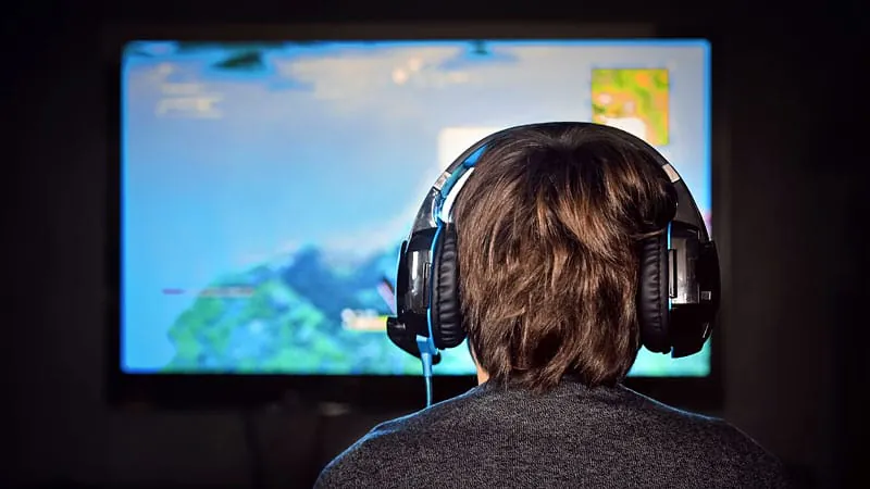 Screen time is hurting kids' grades and mental health, major review finds