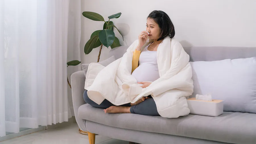 Maternal flu during pregnancy doesn't directly cause kids' neuropsychiatric disorders, study finds
