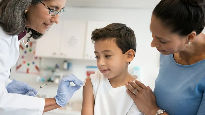 Most clinicians are sticking with the AAP vaccine schedule — and burning out because of it