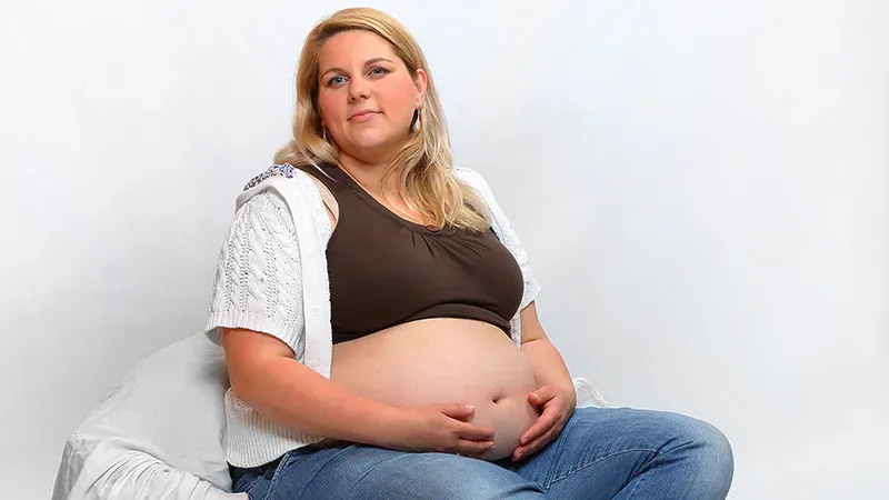 Mom's pregnancy weight may shape her child's MS risk